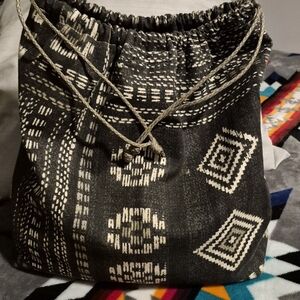 Stylish Black and White Drawstring Bag